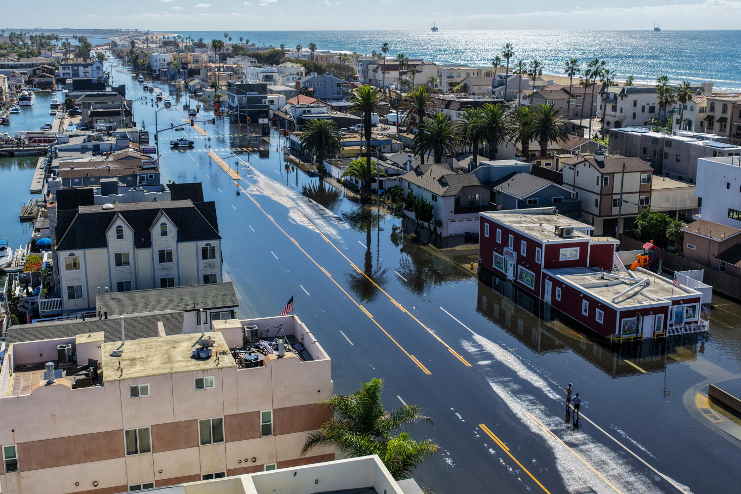 High tides damage 114 structures in Huntington Beach. City warns of more flooding to come